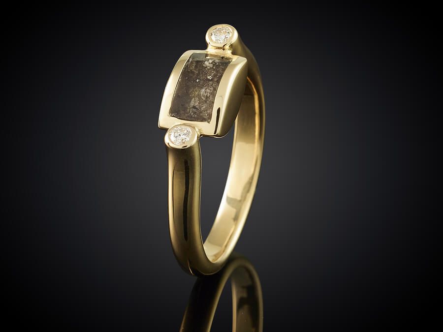 Golden ring with ashes keepsake