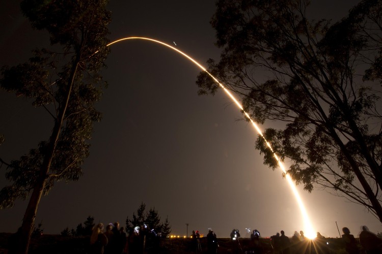 space rocket launch at night