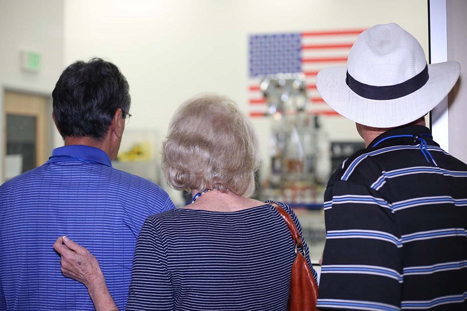 A family viewing the OTB satellite