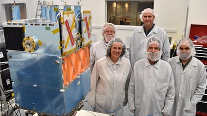 Celestis and General Atomics staff next to OTB