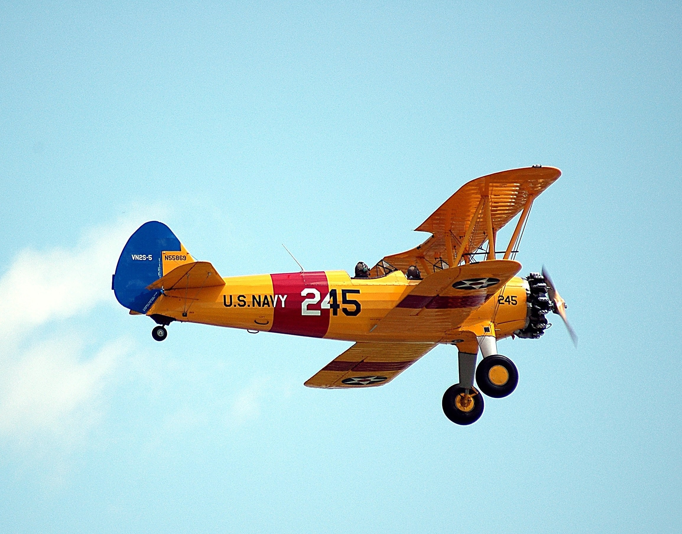 Small plane scattering ashes in the sky