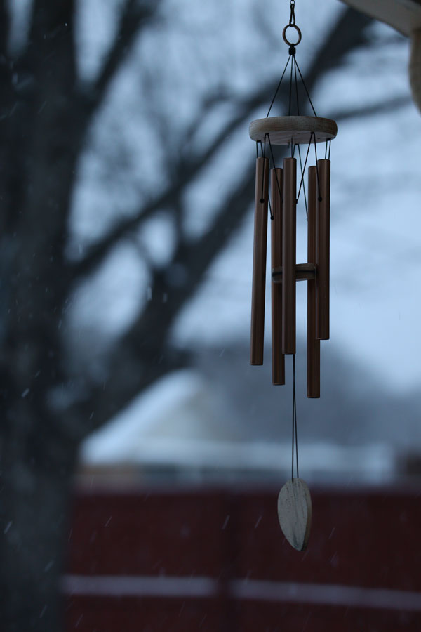 wind chime hanging in a door