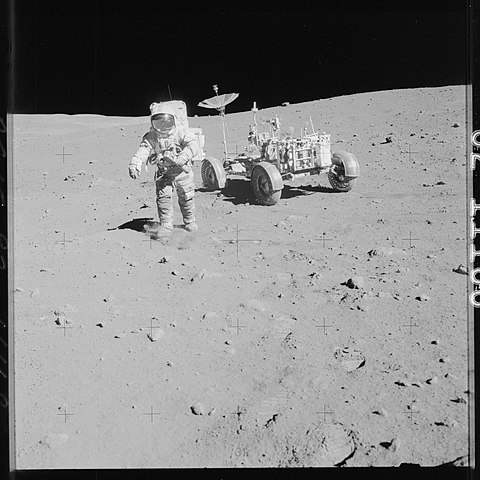astronaut collecting lunar soil samples