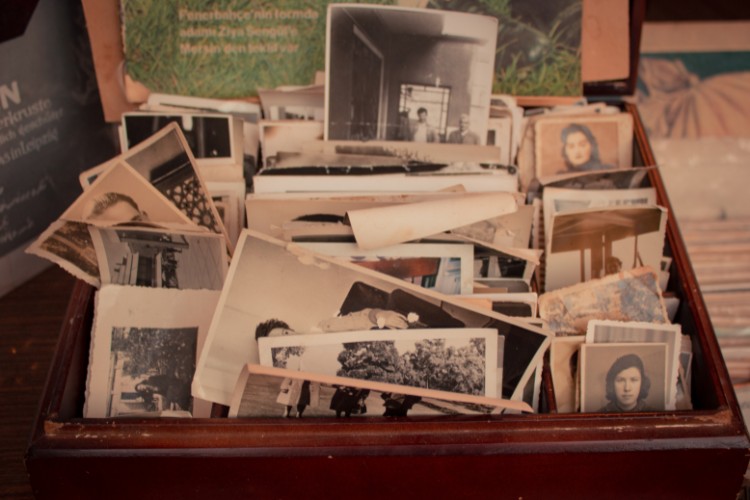 old photos in a brown old wooden box