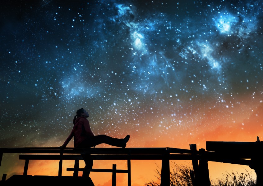 little girl looking at the night sky.jpg