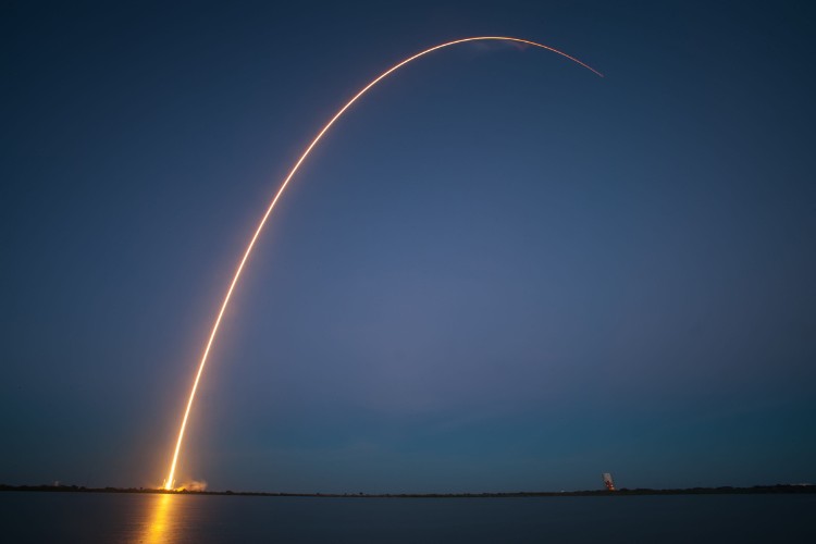 space rocket launch at night