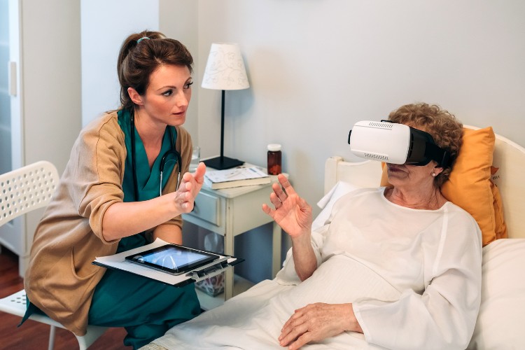 elderly patient wearing virtual reality glasses