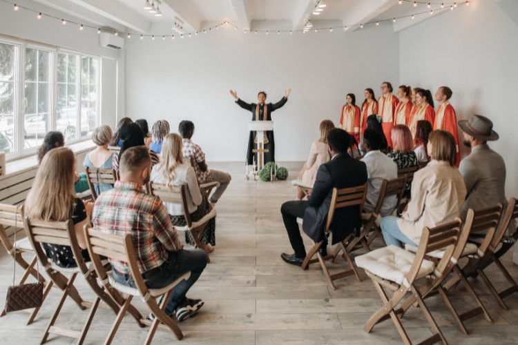 Indoor cremation memorial service with celebrant and choir