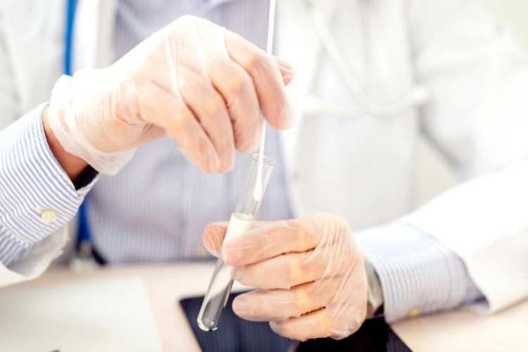 Swab and test tube ready for DNA preservation