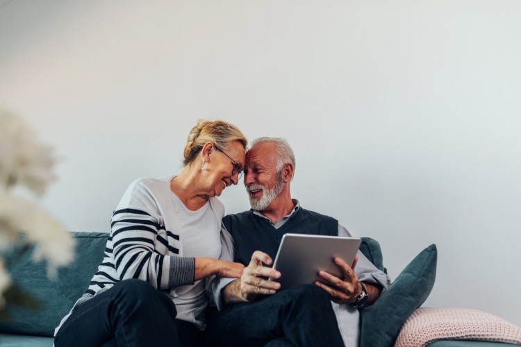 Elderly couple reviewing DNA banking for legacy and memorial planning