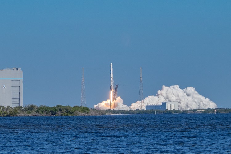 Rocket launch symbolizing a spaceflight memorial with DNA or cremated remains