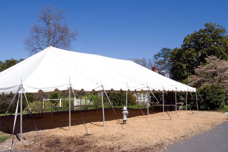 Outdoor memorial tent prepared for a memorial gathering