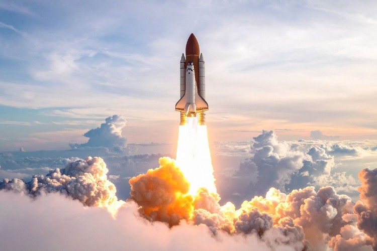 A private spaceflight company rocket liftoff representing innovation in spaceflight technology