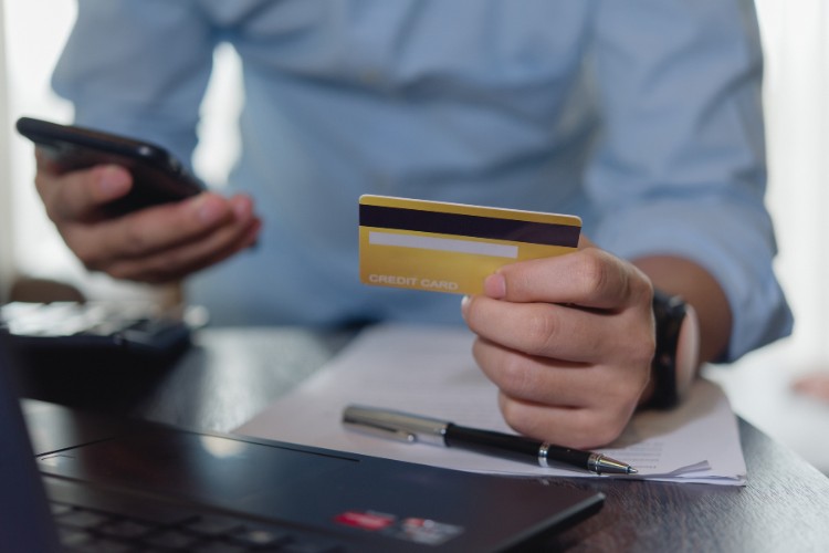 Space tourist purchasing a commercial orbital spaceflight ticket online